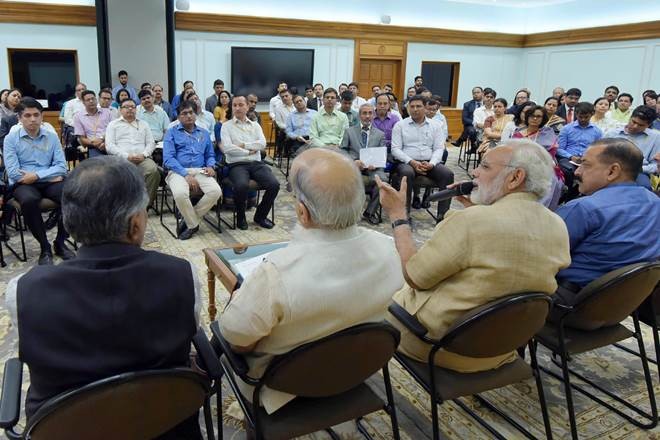 PM asks bureaucrats to break silos to speed up work