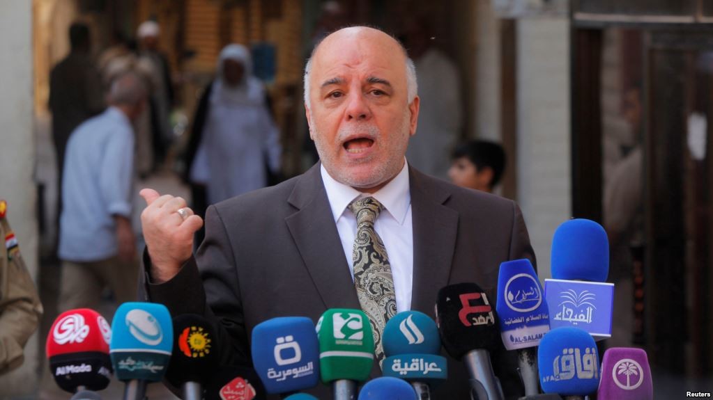 Iraq PM Haider al-Abadi promises to defend Kurds against any attack