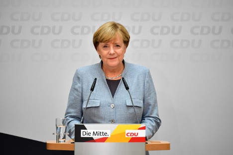 Merkel Confirms Ready To Govern With Liberals And Greens