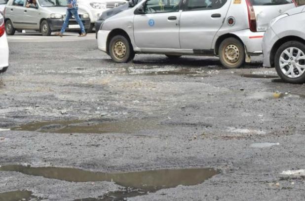 Pothole Claims One More Life:Woman Run Over By Truck