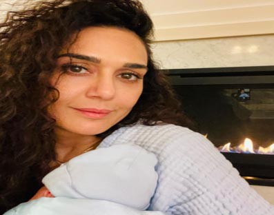 Preity Zinta is loving 'burp cloths, diapers and babies'