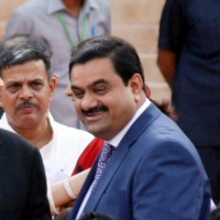 Adani may say no, analysts don't rule out group's entry into consumer mobility