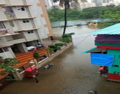 Heavy rains pound Mumbai, local trains hit