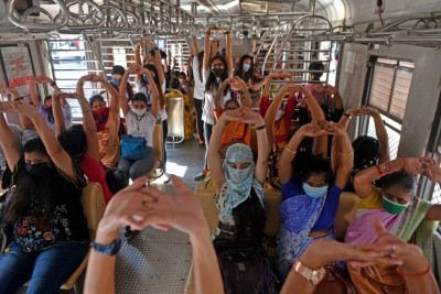 Yoga in train: Mumbai local commuters perform asanas while travelling