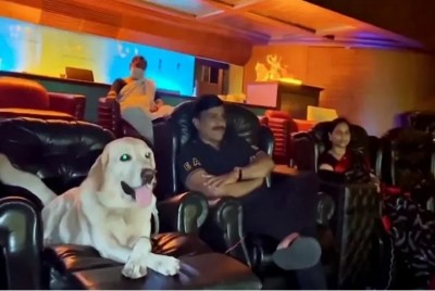 Mining baron Janardhana Reddy watches '777 Charlie' with pet dog