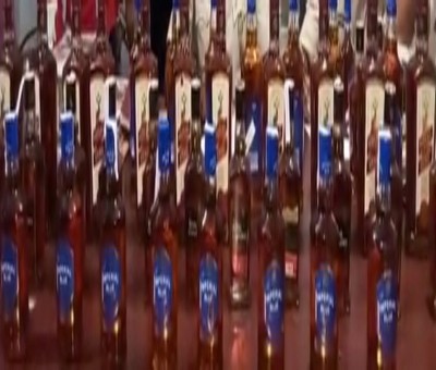 Guj police orders inquiry into liquor smuggling using police vehicle