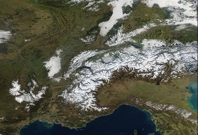 Climate change turning snow covered white Alps green