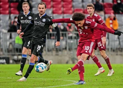 Bayern down Bielefeld to stay atop in Bundesliga