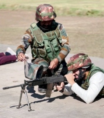 Vijay Deverakonda shoots with a rifle along with a jawan