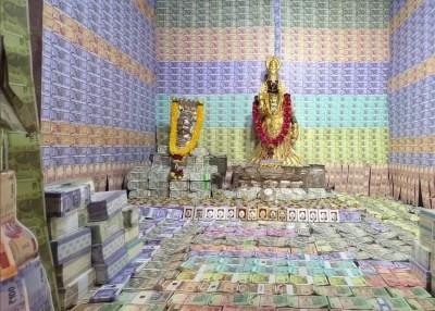 Andhra temple decorated with currency notes, gold