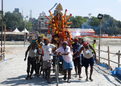 Devotees bid adieu to goddess Durga on Vijayadashami in NE