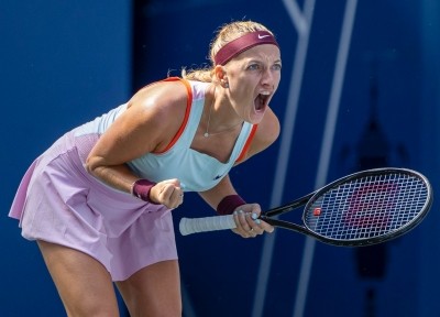 US Open: Kvitova saves two match points to beat Muguruza